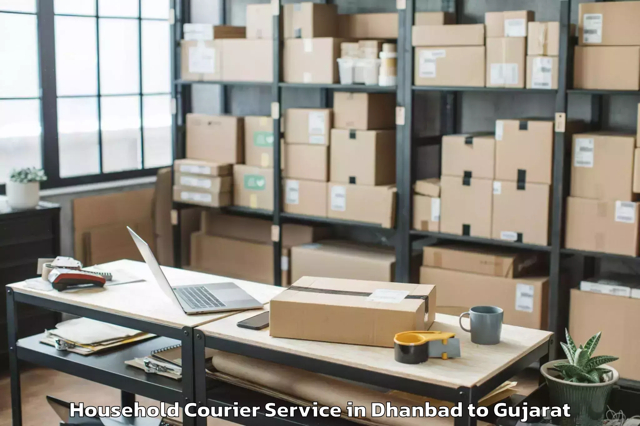 Book Your Dhanbad to Delvada Household Courier Today